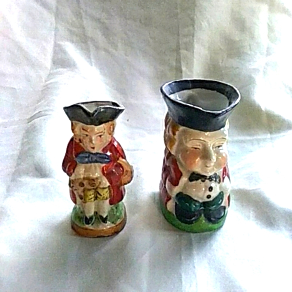 Vintage miniature Toby jugs.